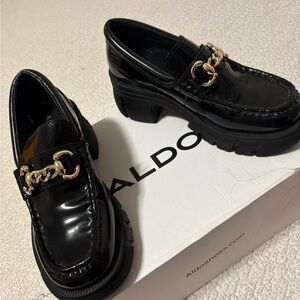 ALDO Glossy Black Loafers with Gold Chain Accent